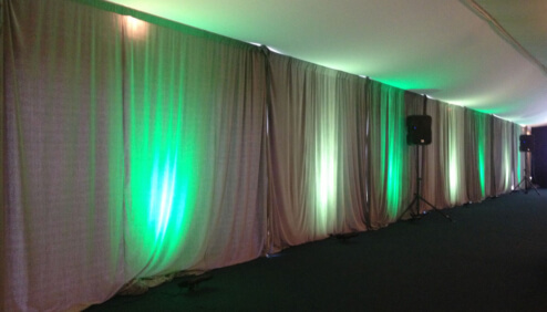 Black-Drape-With-Uplights-for-Rent