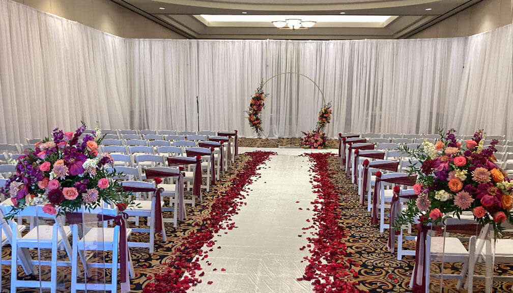 White Pipe and Drape set up in a ballroom 
