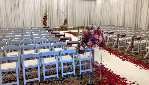 White Pipe and Drape Wedding --- Wooden Chairs